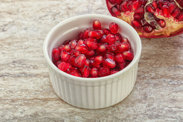 Ripe red Pomegranate seeds in the bowl
