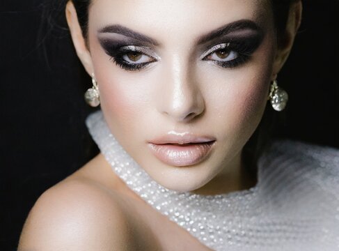 Fashion model beauty photography, face makeup closeup 