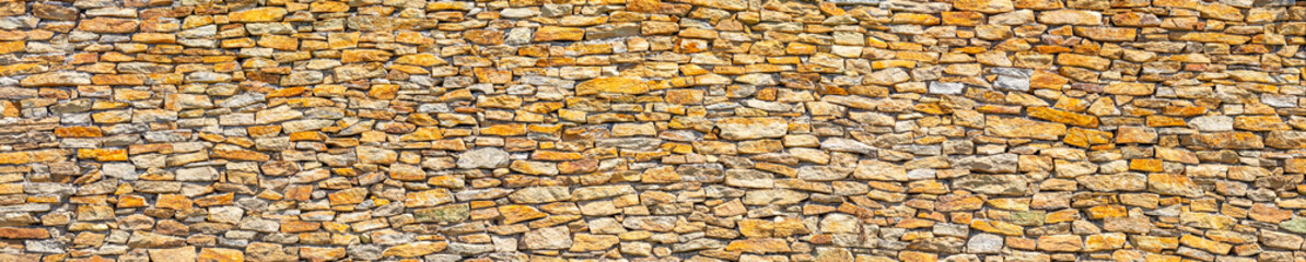 Earthy Elegance: Stone Slate Wall in Warm Tones