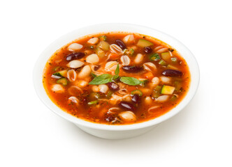 Italian minestrone soup in a white porcelain soup bowl isolated on a white background.  - 683553016