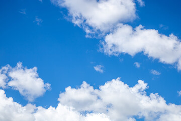 Naklejka na ściany i meble Bright blue sky with light clouds. Calm texture or background