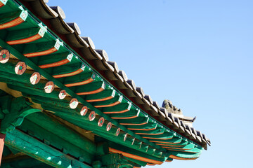 a beautiful traditional Korean eaves. Heaven and traditional eaves. delicate woodwork. Hanok.
