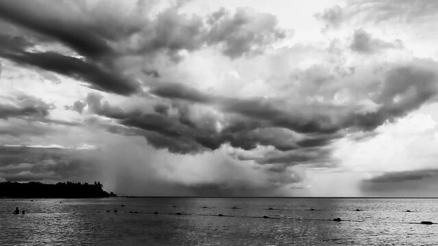 Thunderstorm strong monsoon rain hurricane gloomy clouds Playa del Carmen.