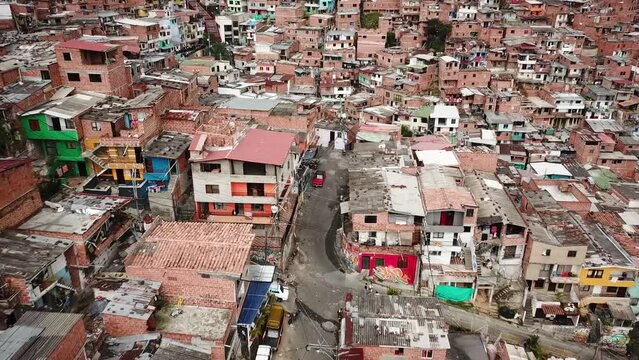 Aerial drone footage of Comuna 13 slum, favela in Medellin, Colombia, Latin America. Most dangerous neighborhood in the world. High quality 4k footage