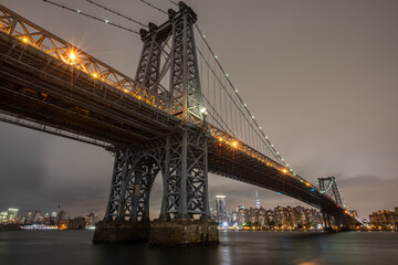 The Williamsburg Bridge is a suspension bridge in New York City across the East River connecting...