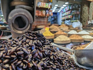 Amman, Jordan,Different kind of grocery stores at the local bazaar(souk) in Amman,traditional local market place with food and spices in bowls and bags,fruits and meat