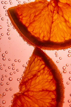 Close-up Orange slices in bubbly water