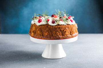 Chocolate covered Christmas cake with Christmas tree branches