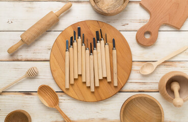 Carpenter tools with wooden objects on table,top view