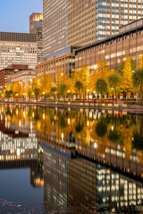 Night view of Marunouchi and Hibiya in Tokyo with water reflection during autumn