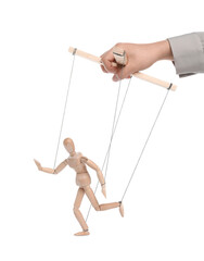 Woman pulling strings of puppet on white background, closeup