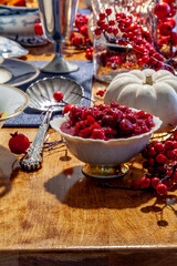 Cranberry sauce on a holiday table with duck, cranberry sauce