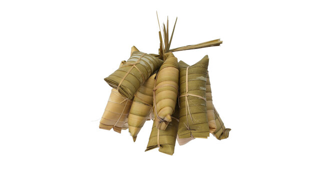 A group of lepet ketan on white background. Lepet ketan is a traditional Indonesian sticky rice cake made from a mixture of glutinous rice, grated coconut, peanuts, and wrapped in coconut leaves.
