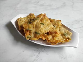 mendoan or fried tempeh in a plate