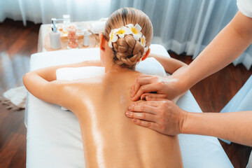 Caucasian woman customer enjoying relaxing anti-stress spa massage and pampering with beauty skin...