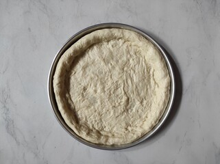 pizza dough in a pan 