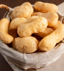 Brazilian starch biscuit in a basket( biscoito polvilho made with tapioca or cassava flour ). Typical Brazilian biscuit