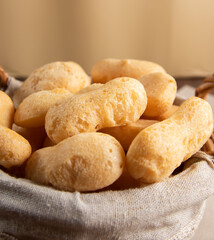 Brazilian starch biscuit in a basket( biscoito polvilho made with tapioca or cassava flour ). Typical Brazilian biscuit