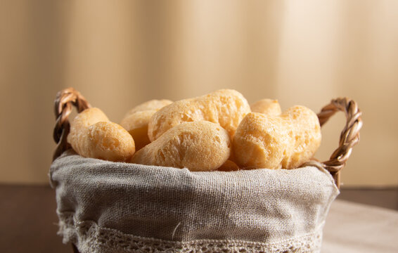 Front View Brazilian starch biscuit in a basket( biscoito polvilho made with tapioca or cassava flour ). Typical Brazilian biscuit
