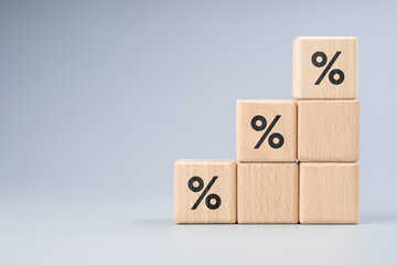 Step stairs built with wood cubes with percentage icons, percent increase by step, commission, sales, growth market share