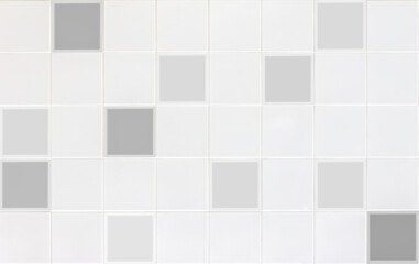 white tiles wall in the office. White tiled wall for bedroom, kitchen, bathroom and interior design. White tiled wall in clean and symmetrical textured background view with grid texture background.