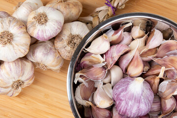 Purple and white heads and cloves of garlic