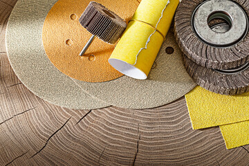 Abrasive Materials On Wood Background.