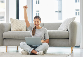 Winner woman, laptop and fist on floor for success, goal or bonus in trading, stock market or deal....