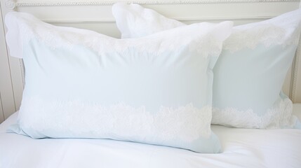 White pillows on the bed close-up. Bright interior of a cozy bedroom in a rustic style. A place for privacy and relaxation from the bustle of the city.