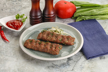 Kebab with beef served onion