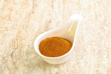 Dry Paprika powder in the bowl