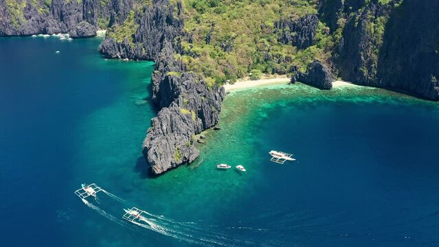 Sea mountains, travel yacht and drone aerial perspective view of boat destination, tropical nature landscape or water surface vessel. Bali location background, vacation journey and holiday adventure