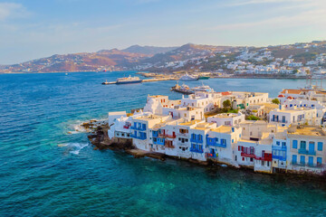 Drone view of Mykonos Greek village in Greece, colorful streets of Mikonos village. Little Venice Mykonos town