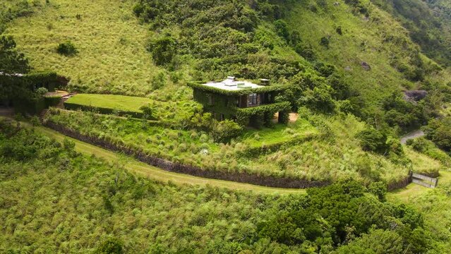 Areal landscape video of a modern house in a urban area in sri lanka drone footages