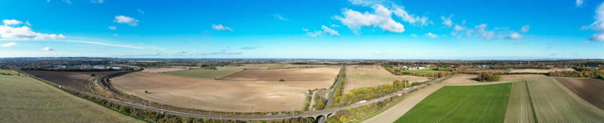 Fototapeta na wymiar Aerial Ultra Wide Panoramic View of Countryside Landscape and Agricultural Farms of Letchworth Garden City of England UK
