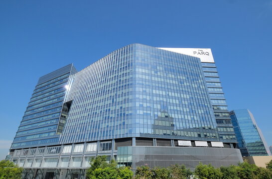Modern glass building mixed-use development The Parq soars into blue sky in Thai capital Bangkok
