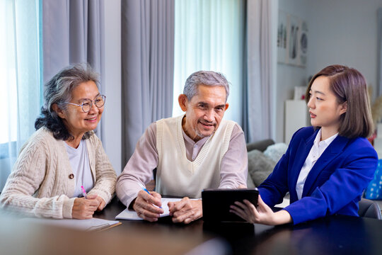 Asian senior couple get advice from lawyer on legal financial contract and insurance health care benefit for retirement home visit service professional consultant