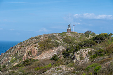 Fototapeta na wymiar Molle, Sweden - May 3, 2022: Kullen Lighthouse at Kullaberg Nature Reserve
