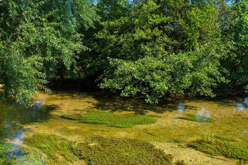 Naklejka premium The River Una as it passes through central Bihac in Una-Sana Canton, Federation of Bosnia and Herzegovina