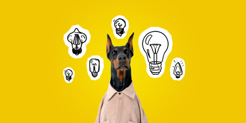 Dobermann head with set of lightbulbs on yellow background