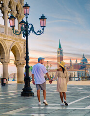 couple on a city trip to Venice, Architecture, and landmarks of Venice. Sunrise cityscape of Venice Italy during summer
