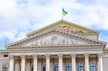 Obraz premium Ukrainian flag on the top of the roof 