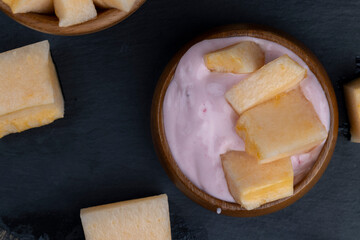 creamy yogurt with melon flavor and chunks