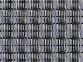 Unique black metal texture steel background. Perforated metal sheet.