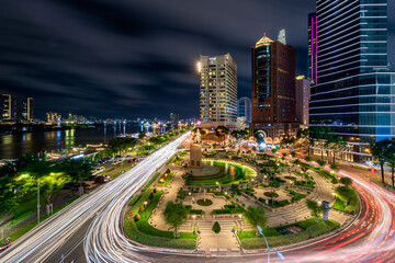 View of Me Linh roundabout with heavy traffic near Bach Dang waterbus station port and Saigon river...