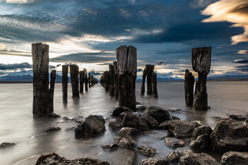 Sunset over the old jetty in Puerto Natales, Chile