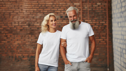 Elderly couple wearing white t-shirts - obrazy, fototapety, plakaty