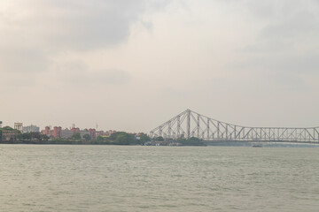 The Howrah Bridge over the holy river Ganges communicating in between Howrah and Calcutta. British period Bridge.