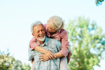 woman man outdoor senior couple happy lifestyle retirement together smiling love fun elderly active...
