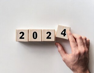 2024 Happy New Year eve wooden blocks flip change hand, countdown starting ending 2023, action schedule calendar strategy future vision, business startup plan resolution, celebration